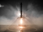 Falcon 9 rocket touches down on a drone ship at sea