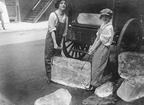 Two women shown delivering ice in 1918