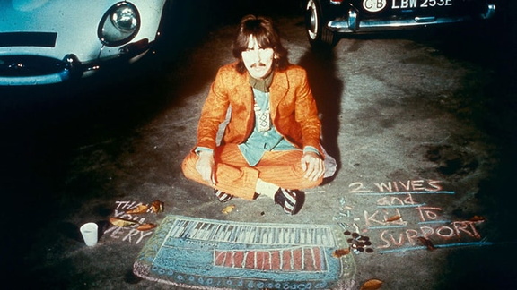 George Harrison panhandling