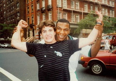 Mike Tyson poses with a young Robert Downey, Jr