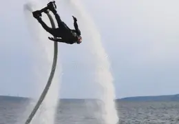 experienced-athlete-does-somersaults-over-water-flyboarding-new-extreme-sport-male-flywardist